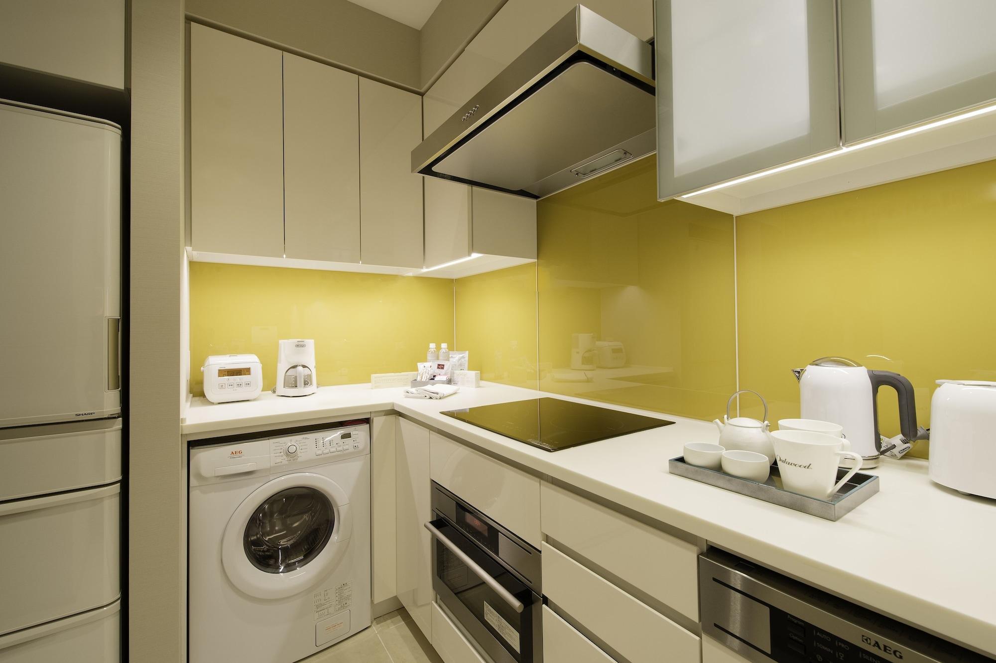 Hotel Oakwood Premier Präfektur Tokio Exterior foto A typical kitchen in a serviced apartment