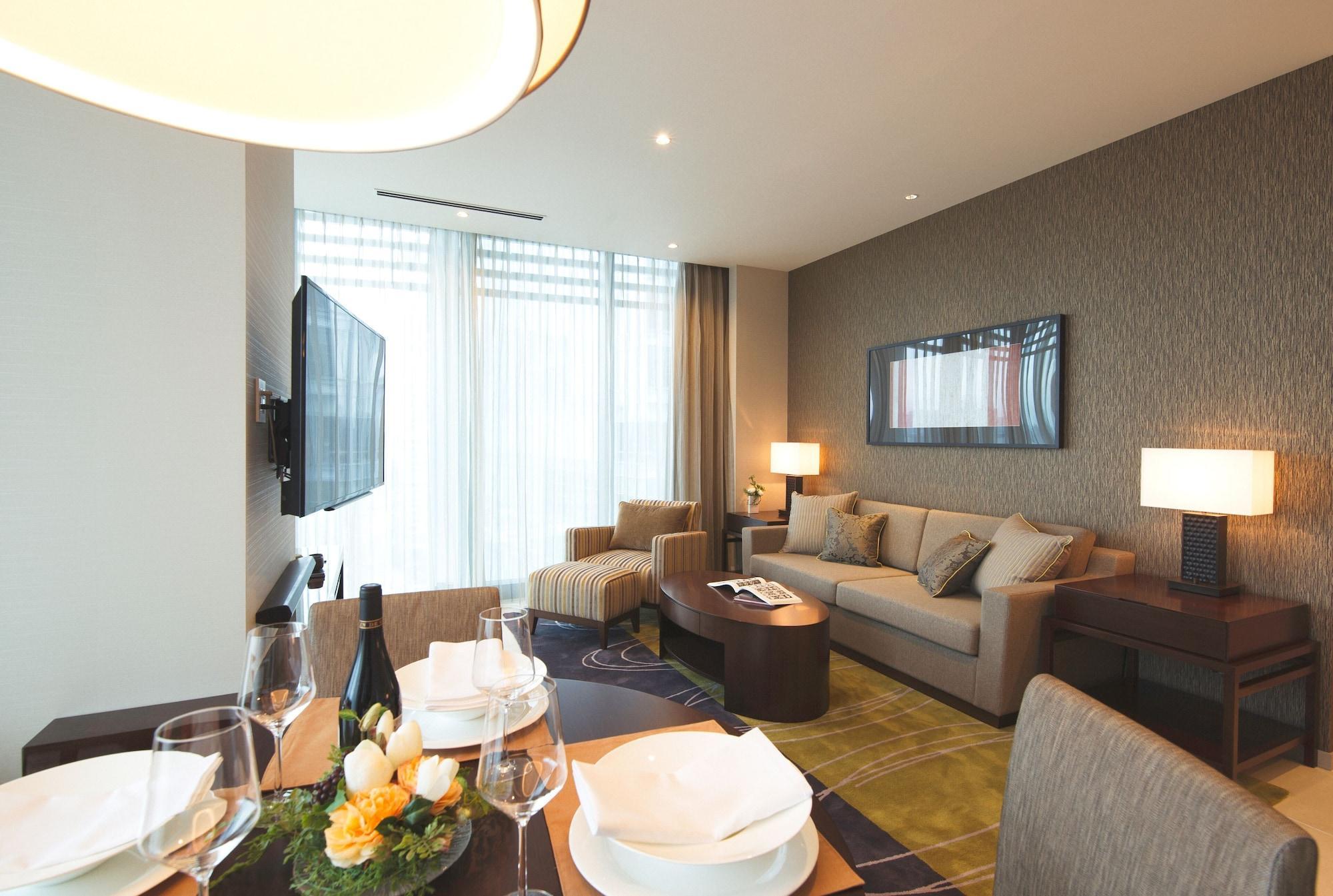 Hotel Oakwood Premier Präfektur Tokio Exterior foto A living room at the hotel
