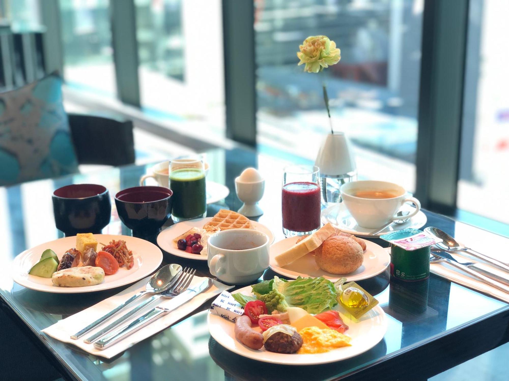 Hotel Oakwood Premier Präfektur Tokio Exterior foto A breakfast at the lounge