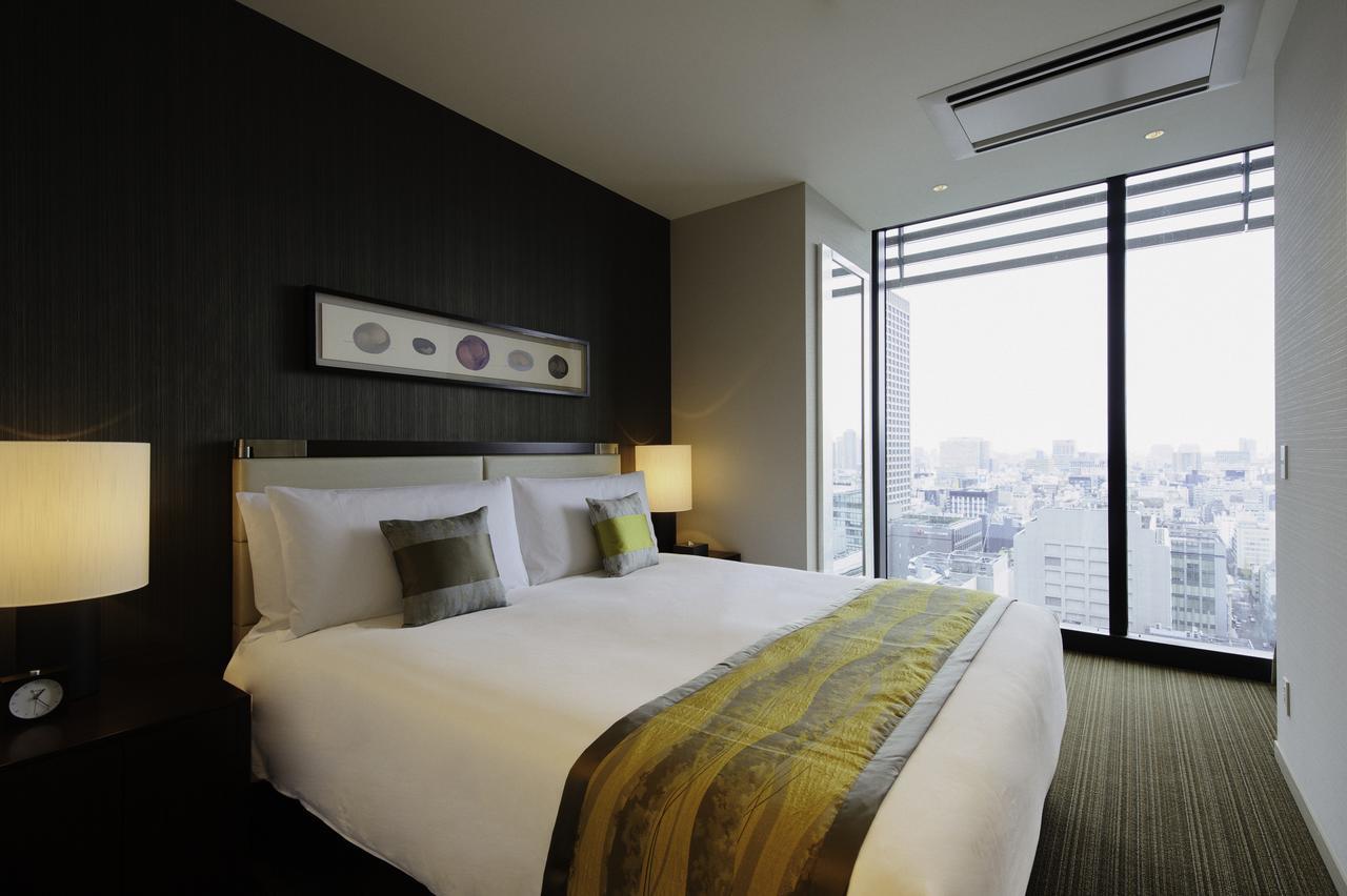 Hotel Oakwood Premier Präfektur Tokio Exterior foto A bedroom at the hotel