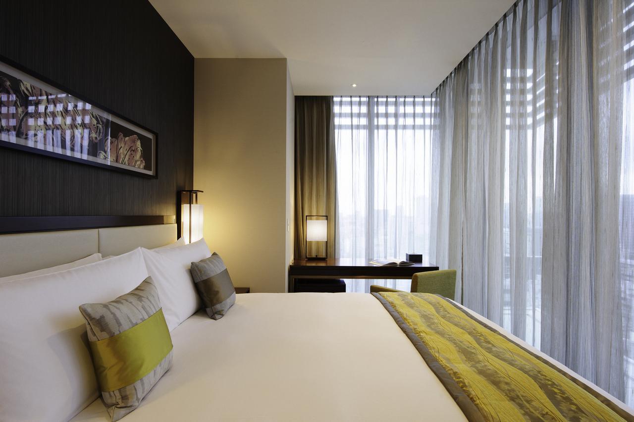 Hotel Oakwood Premier Präfektur Tokio Exterior foto A bedroom at the hotel