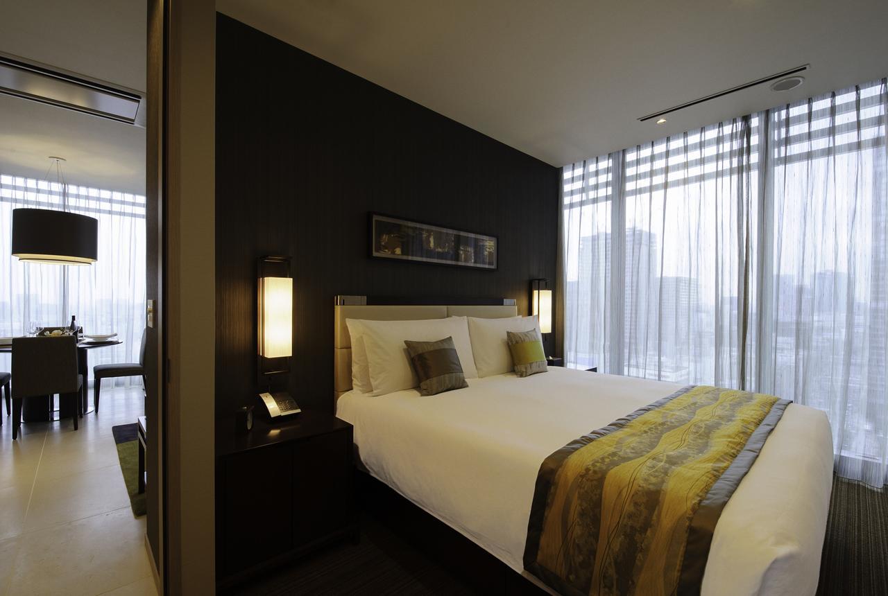Hotel Oakwood Premier Präfektur Tokio Exterior foto A bedroom at the Park Hyatt Hyderabad
